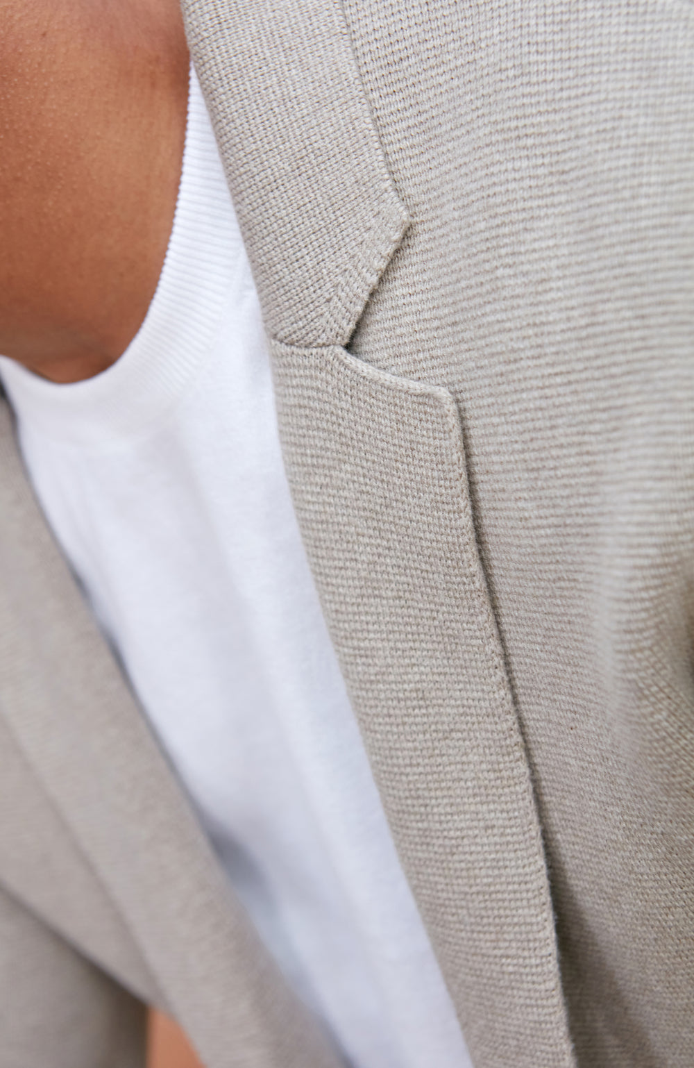 Men's beige unstructured cotton knitted blazer by Paul James Knitwear.