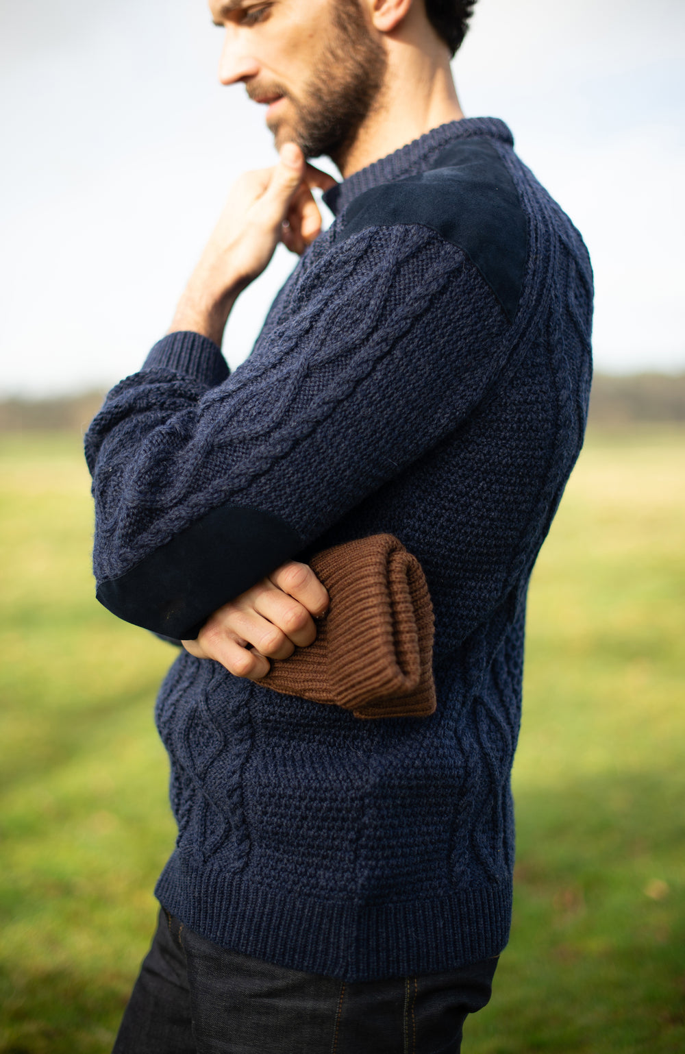 Navy man's wool shooting jumper made in England chunky Merino wool by Paul James Knitwear.