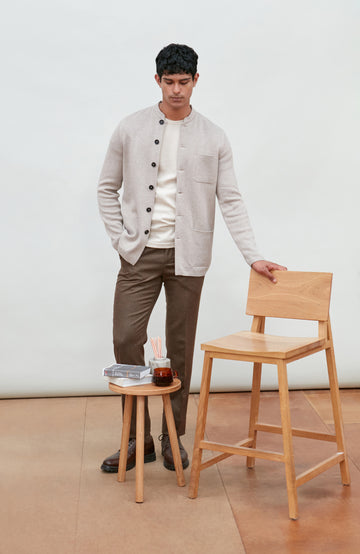 Beige men's stand mandarin Nehru collar cotton jacket by Paul James Knitwear.