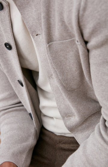 Beige men's stand mandarin Nehru collar cotton jacket by Paul James Knitwear.