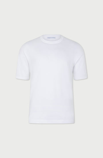 White mens relaxed t-shirt on a light gray background