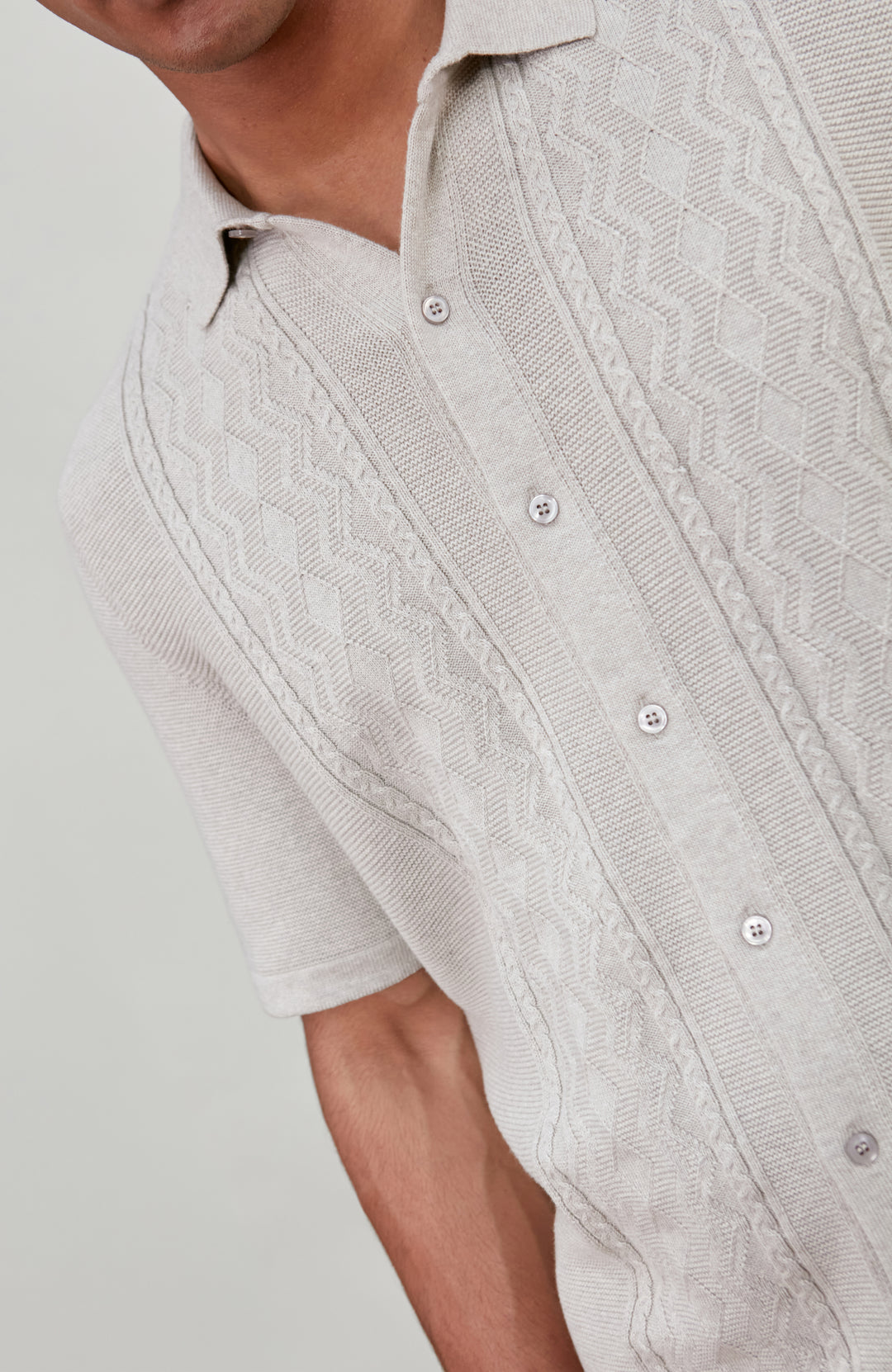 Men's light grey textured knitted fishing shirt by Paul James Knitwear.