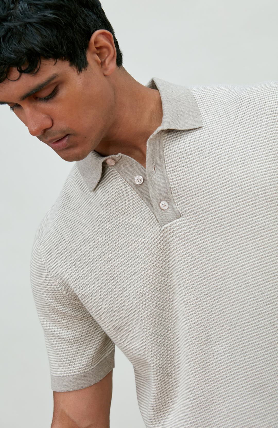 Men's grey two-tone cotton knitted short-sleeve polo shirt by Paul James Knitwear.