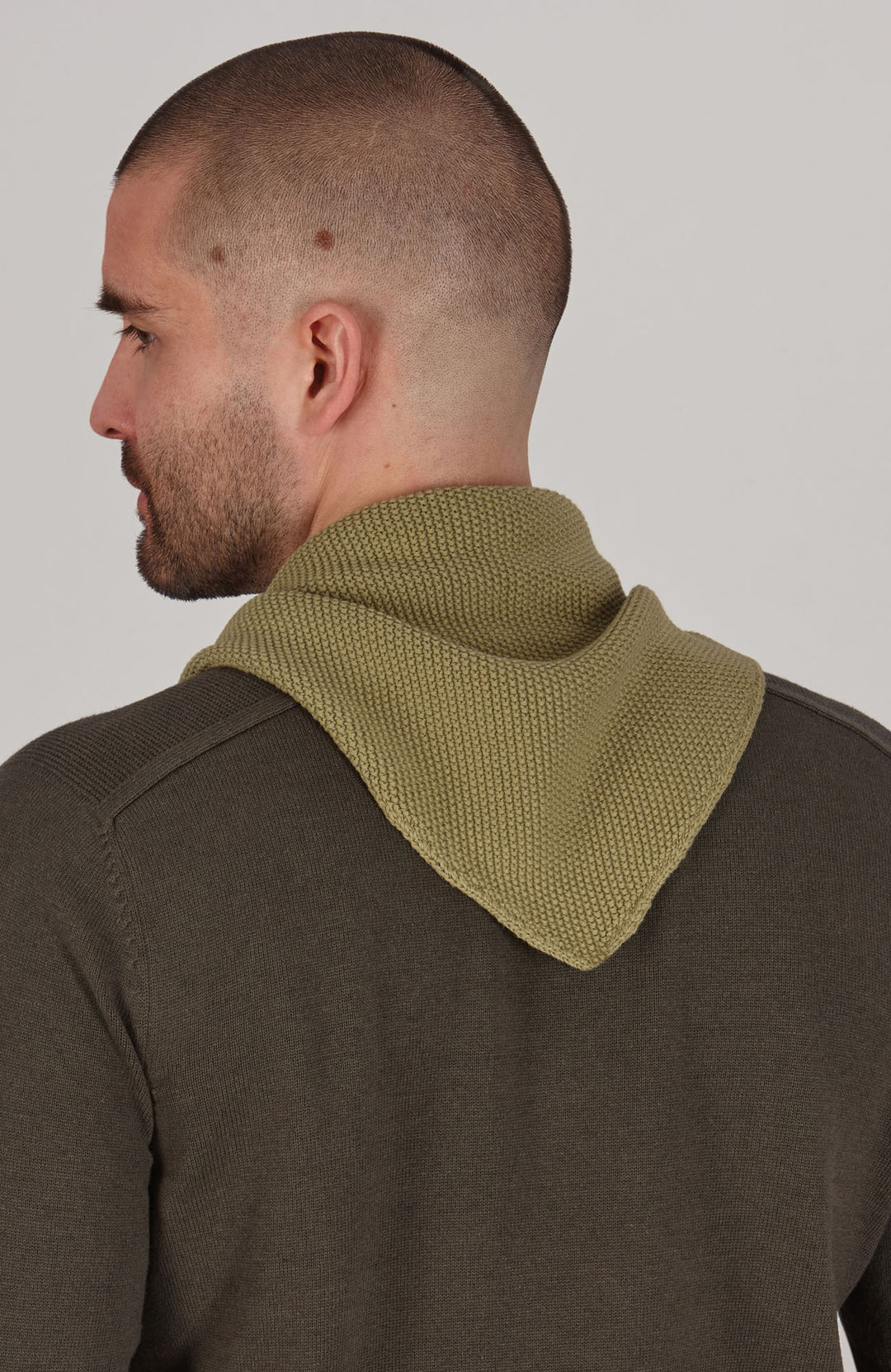 green knitted neckerchief by Paul James