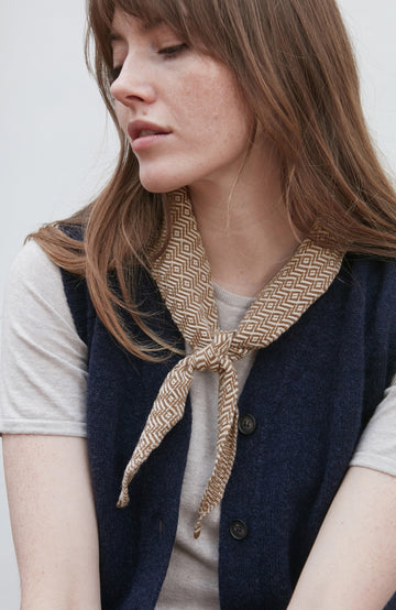 Woman wearing a patterned cotton neck tie