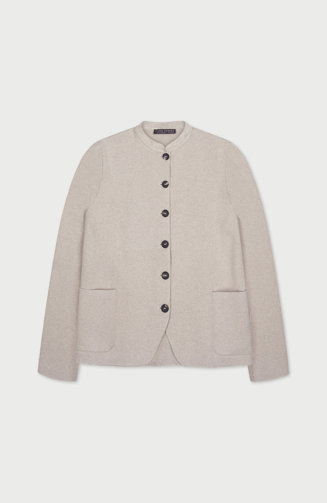 Paul james womens nehru jacket with black buttons on a light gray background