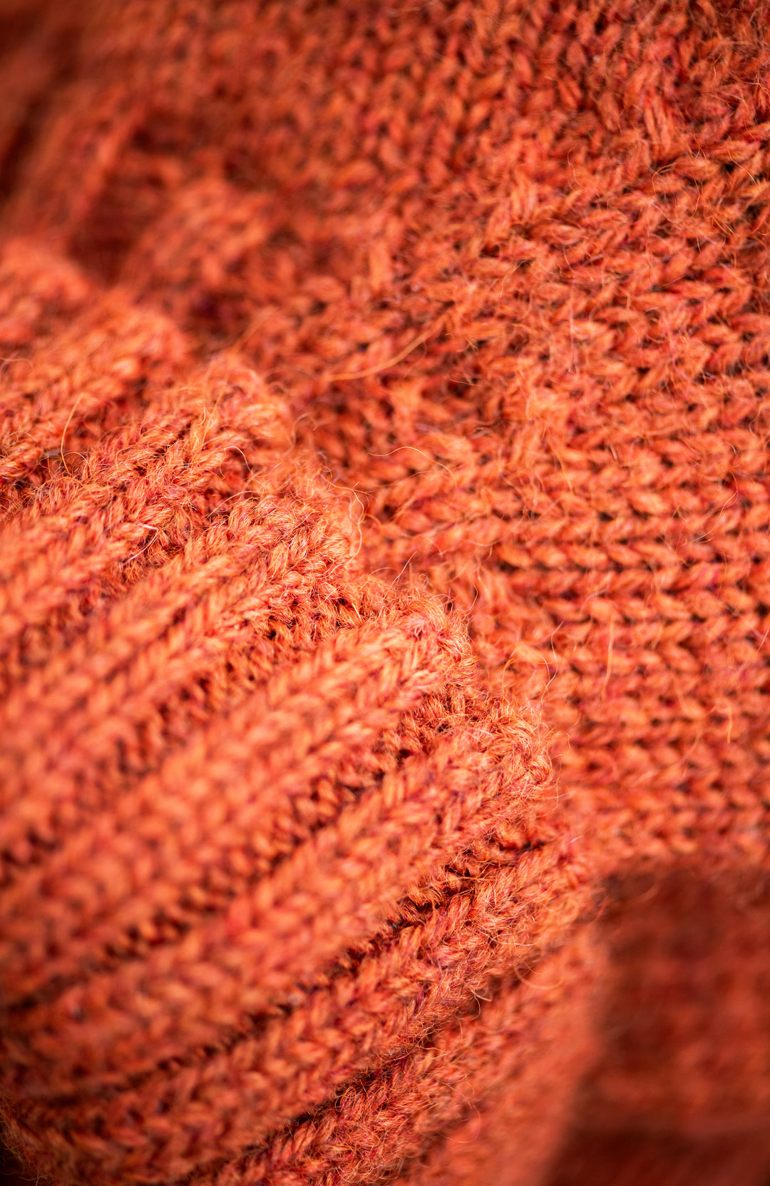 orange mens made in england wool roll neck sweater by paul james