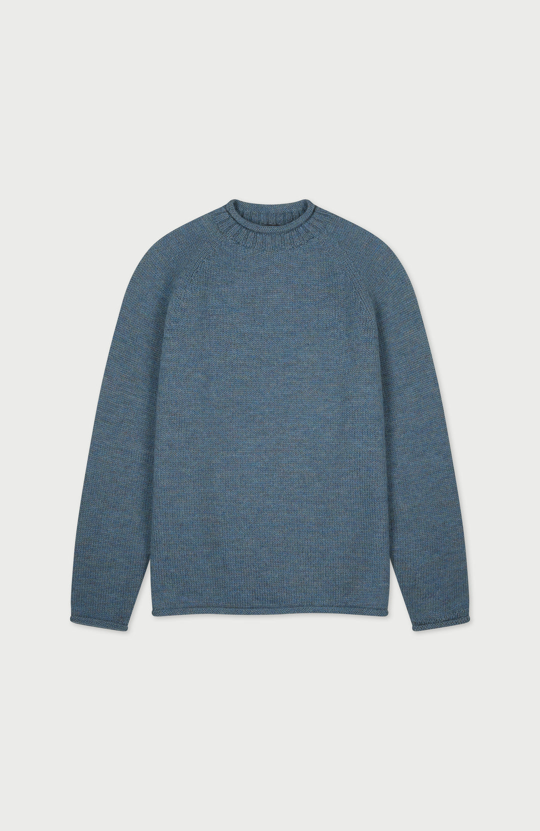 Blue men's fisherman British wool jumper with rolled hems made in England by Paul James Knitwear.