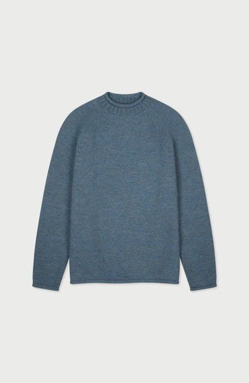 Blue men's fisherman British wool jumper with rolled hems made in England by Paul James Knitwear.