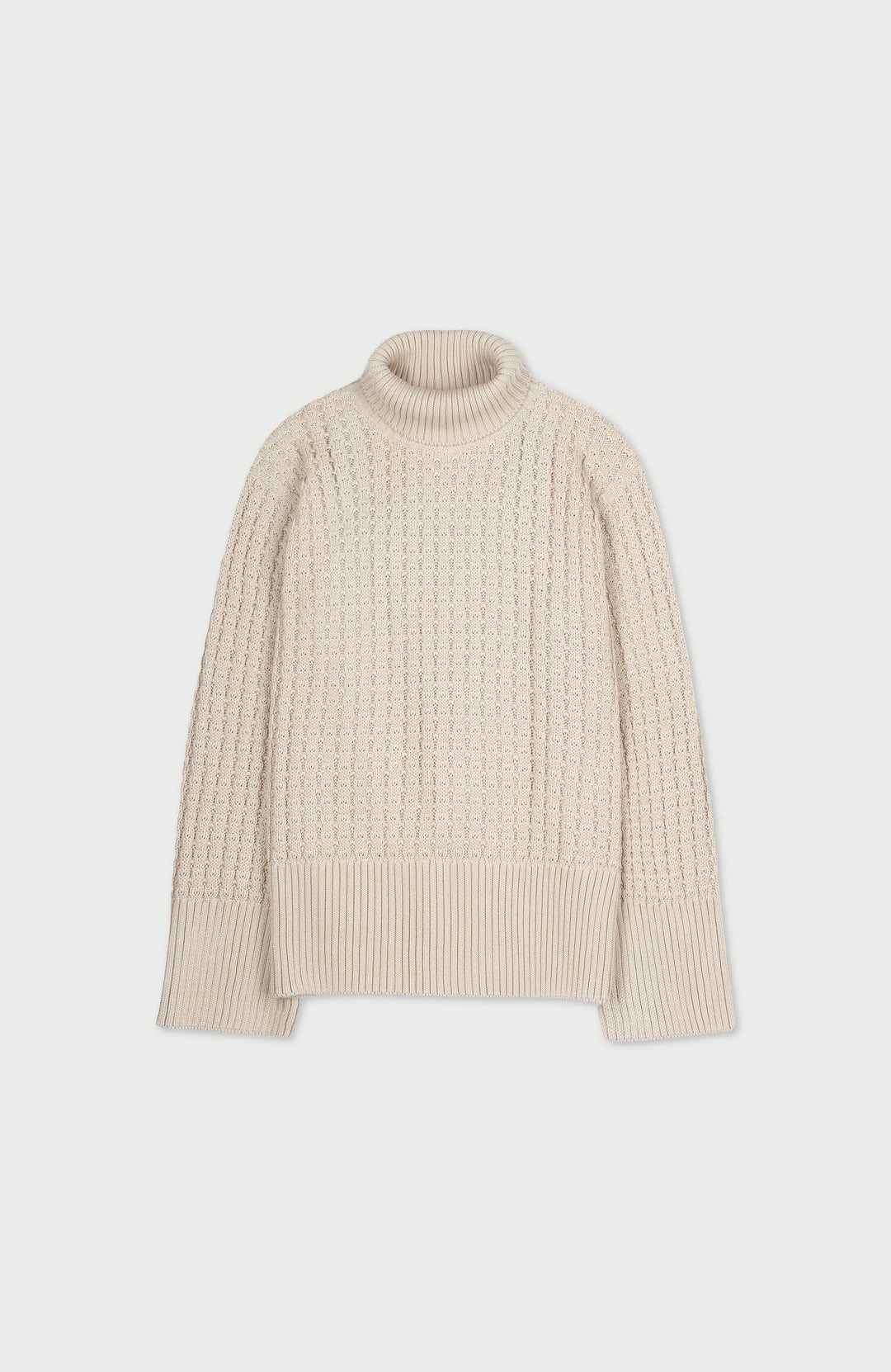 A womens cotton cream-colored, textured cable-knit mock neck sweater displayed flat against a light gray background. Made by Paul James Knitwear.