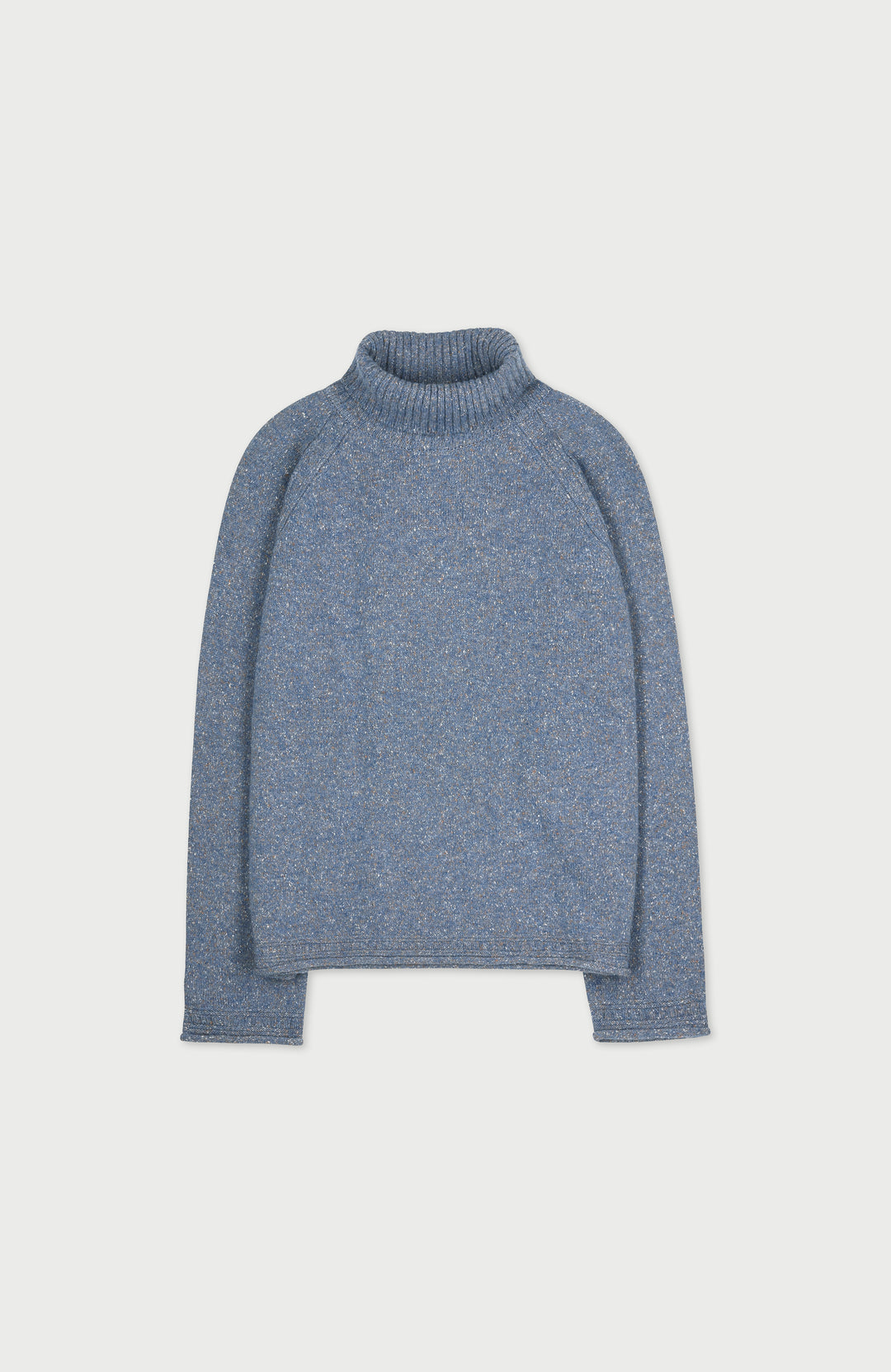 A womens slate blue wool silk knit turtleneck sweater by Paul James Knitwear with a textured, heathered finish, displayed flat against a light gray background.