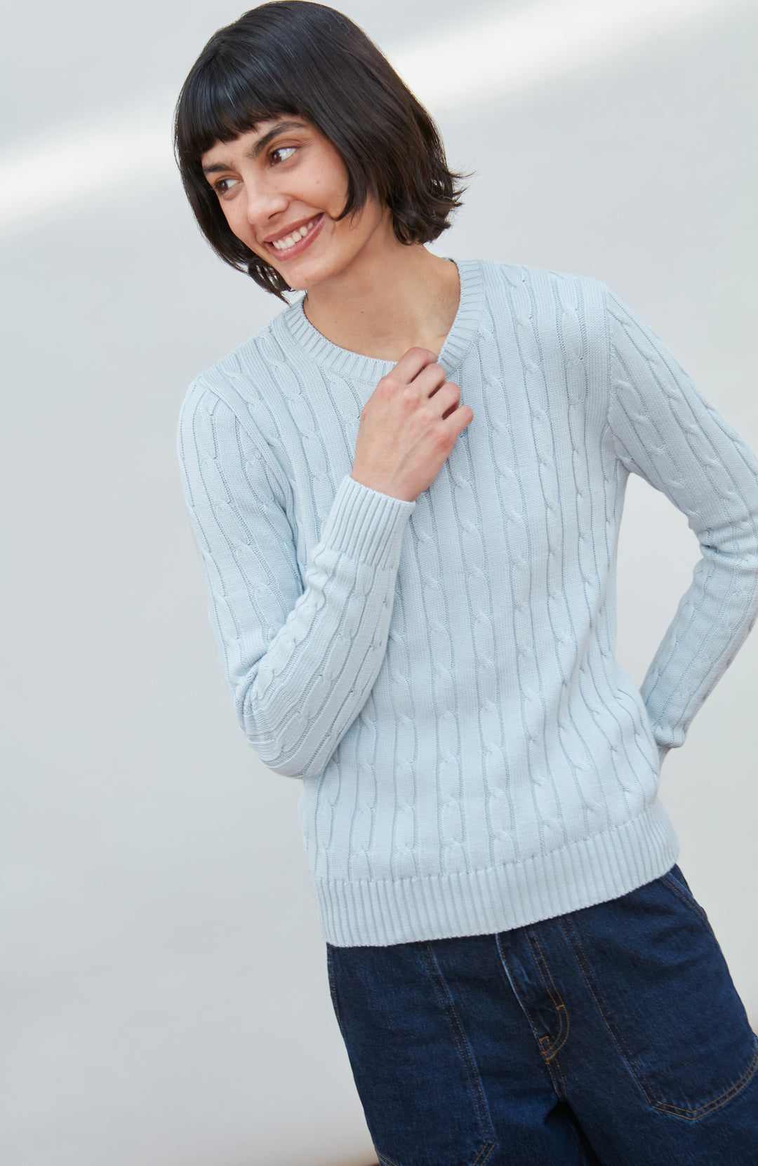 Blue women's round neck cotton cable jumper by Paul James Knitwear. 