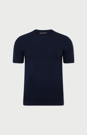 Navy blue merino wool mens t-shirt on a light gray background