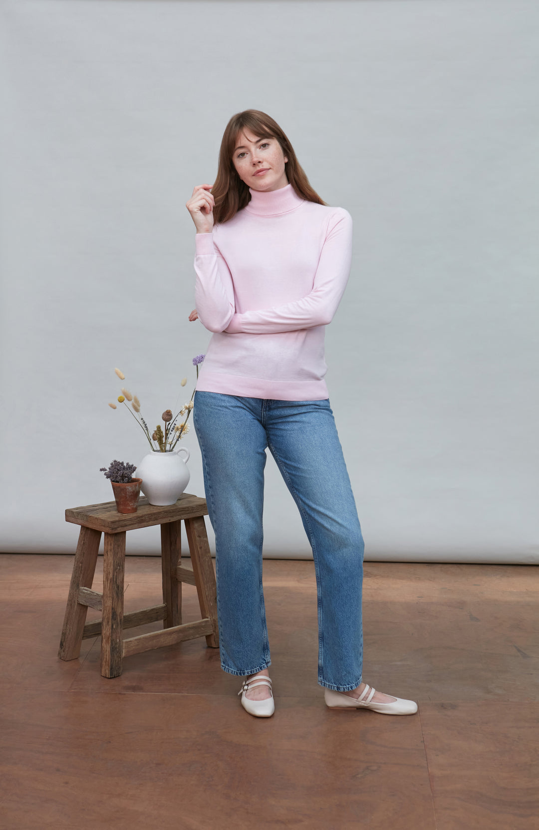 Womens pink roll neck fine cotton sweater by Paul James Knitwear
