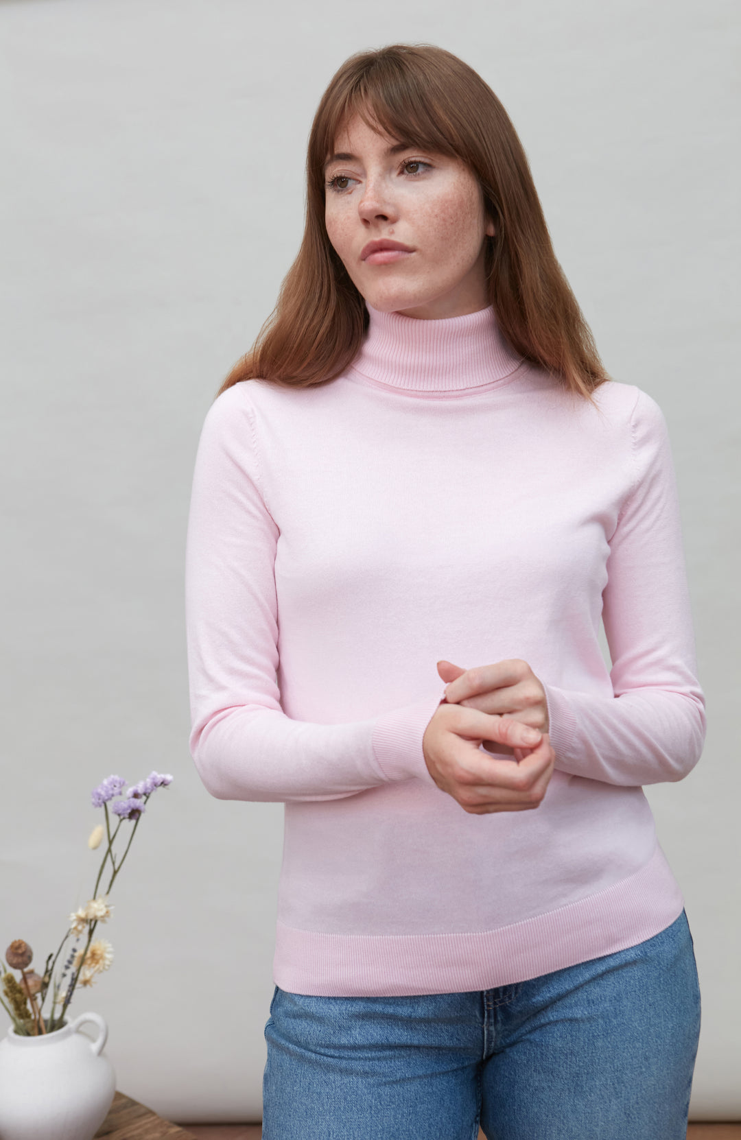 Womens pink roll neck fine cotton sweater by Paul James Knitwear