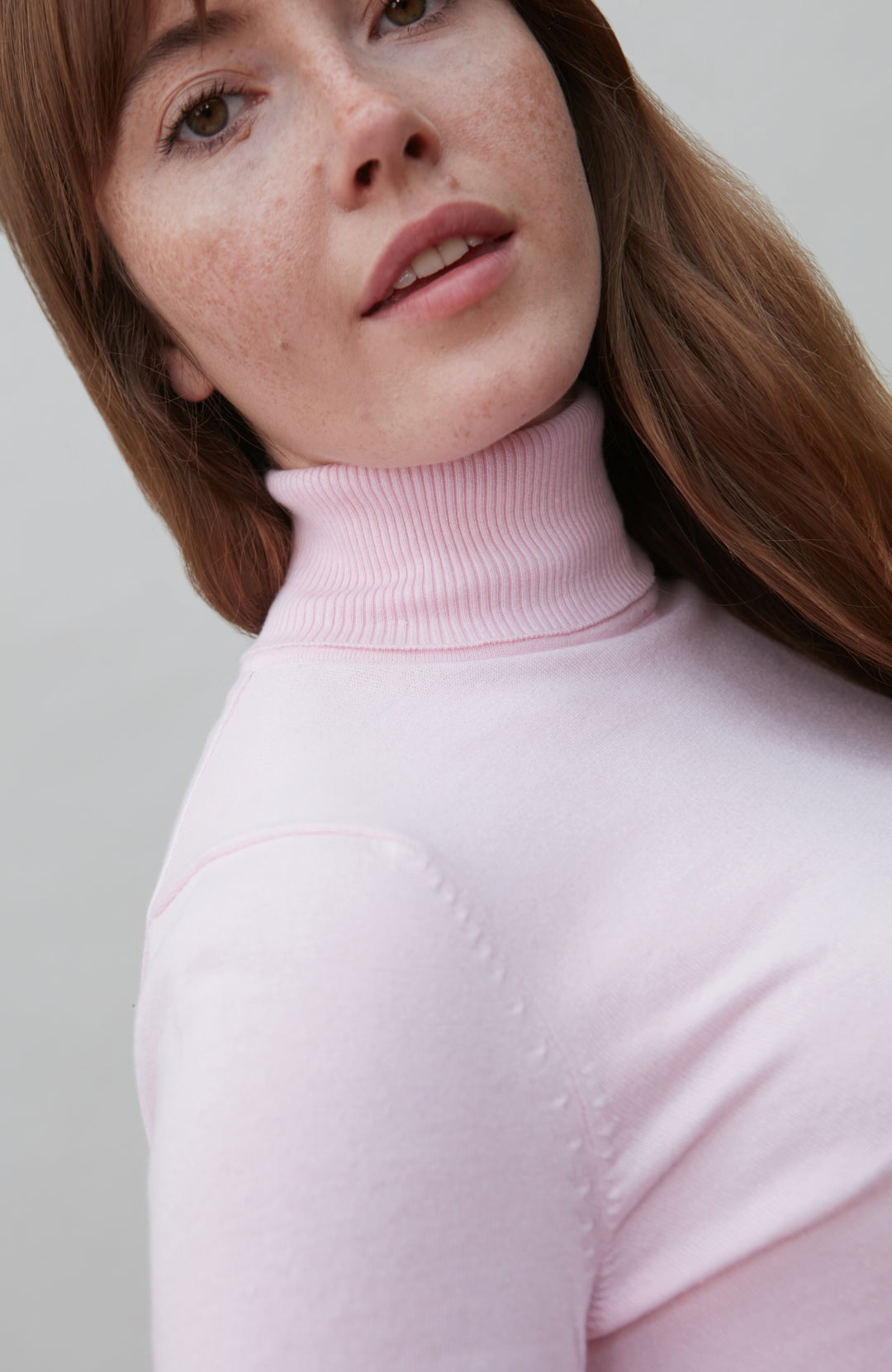 Womens pink roll neck fine cotton sweater by Paul James Knitwear