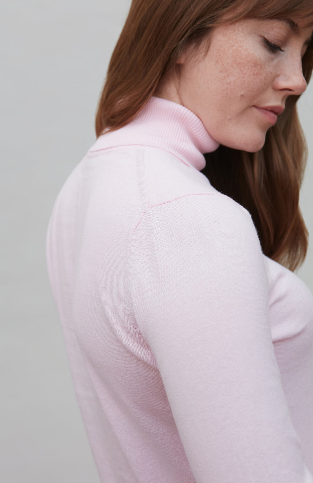 Womens pink roll neck fine cotton sweater by Paul James Knitwear