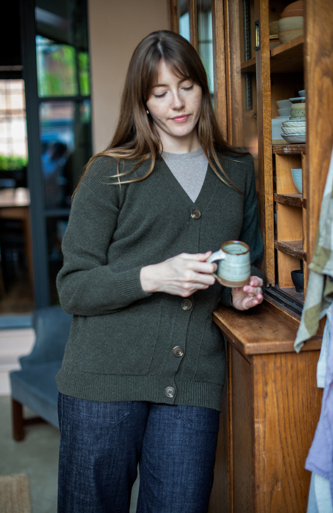 Green Lambswool cardigan by Paul James