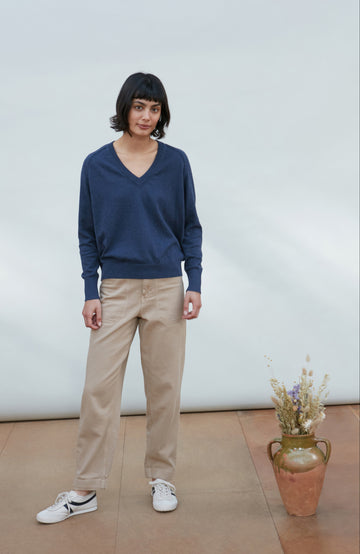 Blue women's deep V-neck cotton jumper by Paul James Knitwear