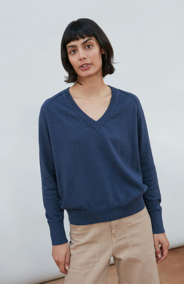 Blue women's deep V-neck cotton jumper by Paul James Knitwear