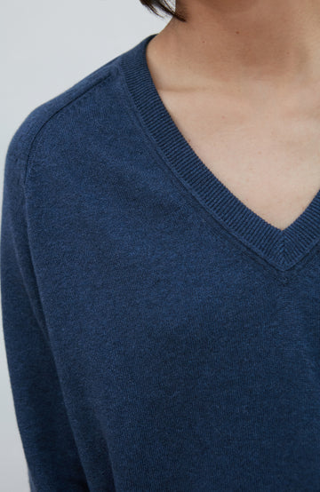 Blue women's deep V-neck cotton jumper by Paul James Knitwear