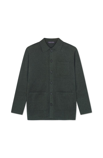 A dark forest green cotton cardigan jacket with a button-up front, collar, and front pockets, displayed flat against a plain white background. Made by Paul James Knitwear.