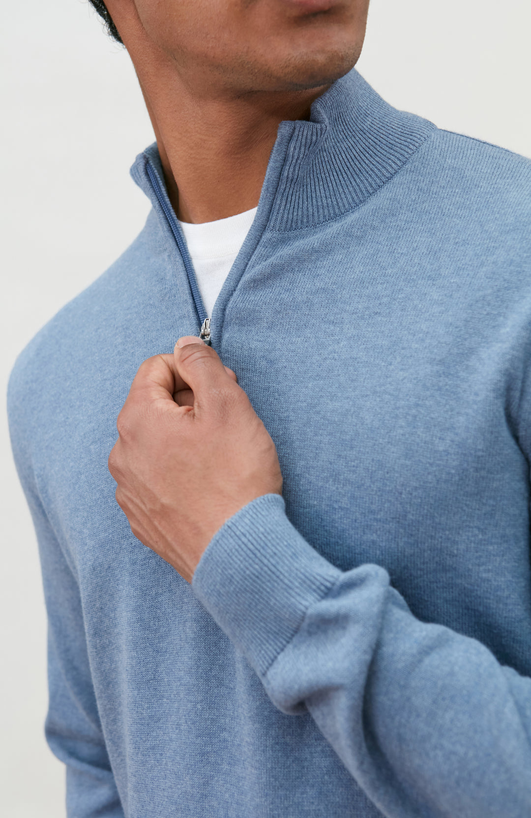 Men's blue zip-neck cotton sweater by Paul James Knitwear.