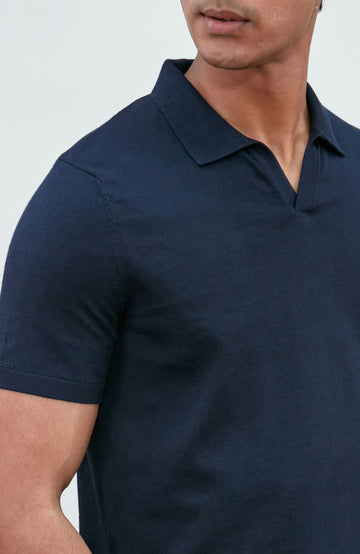 Navy men's short-sleeve polo shirt by Paul James Knitwear, buttonless