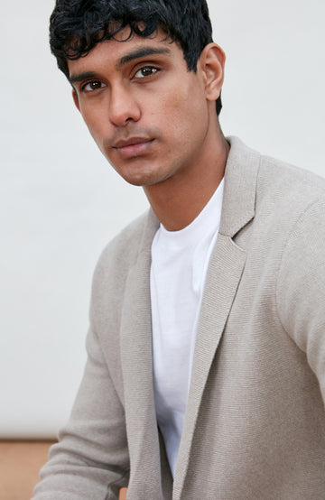 Men's beige unstructured cotton knitted blazer by Paul James Knitwear.