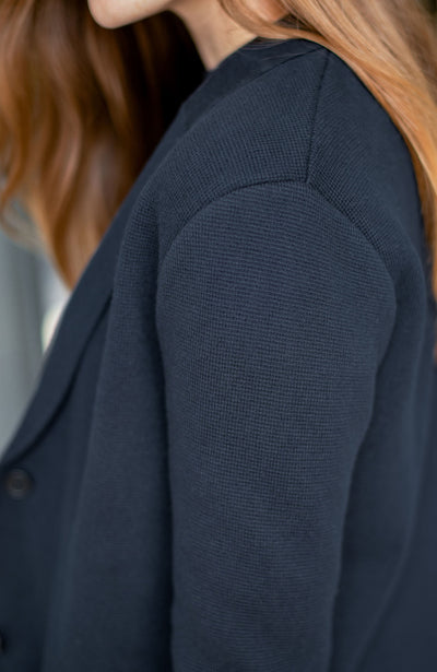 Navy women's knitted blazer