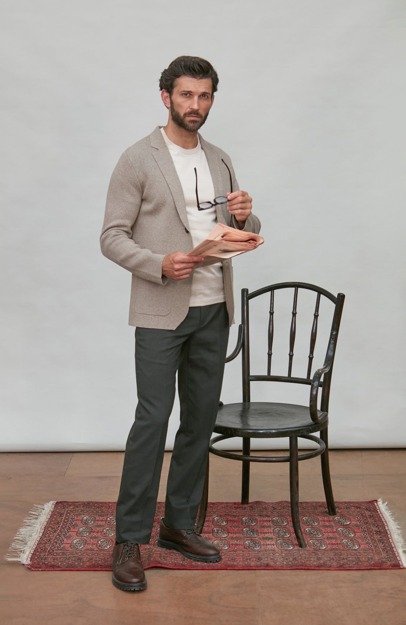 Man wearing brown knitted blazer