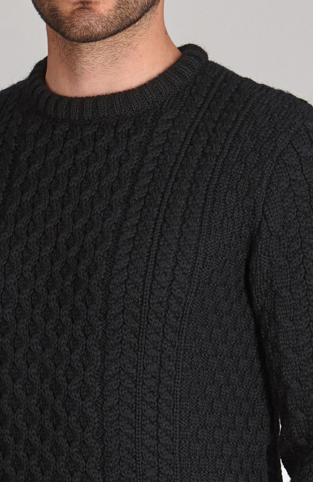 black mens British wool cable jumper by Paul James