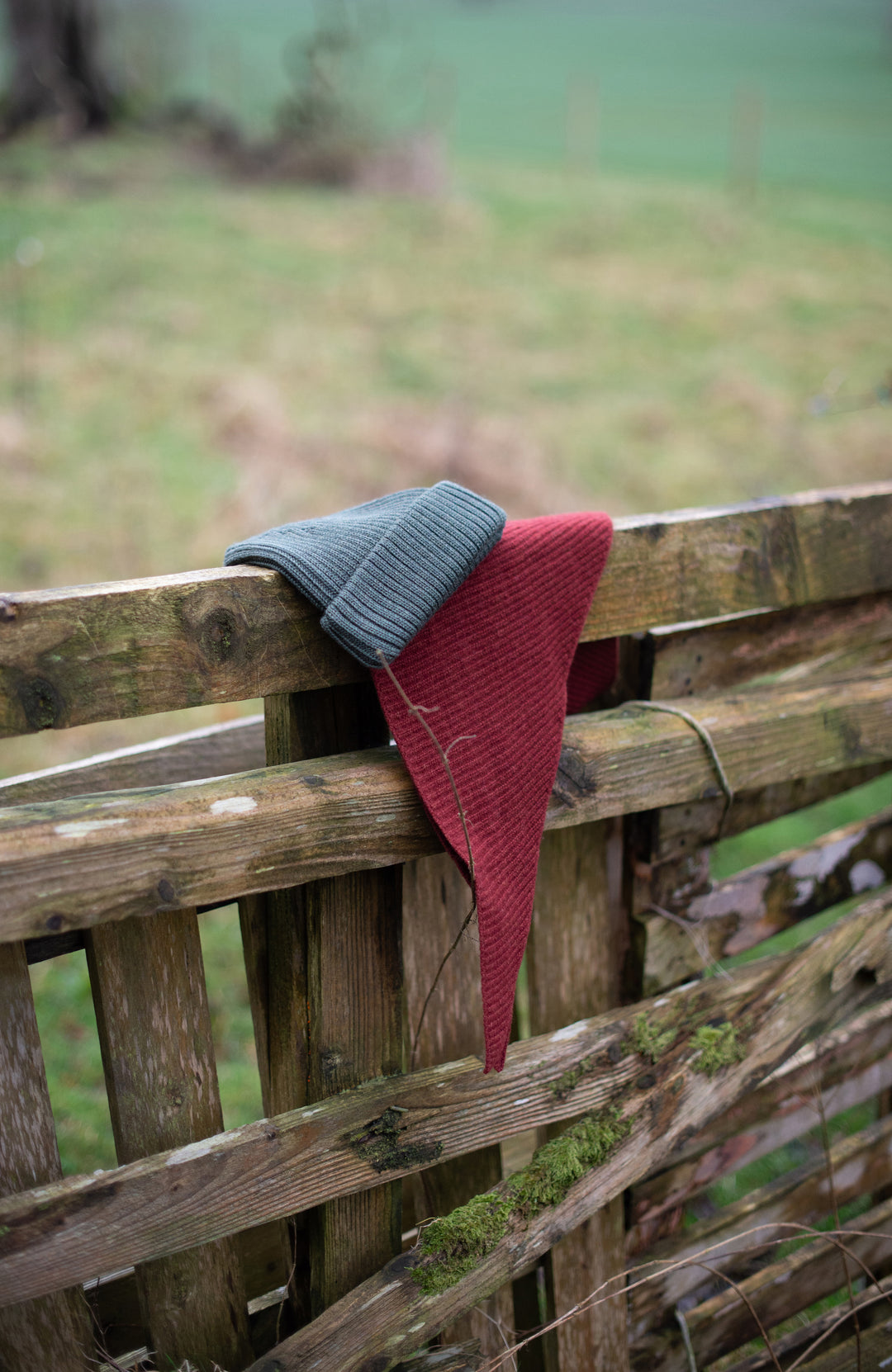 Red wool Triangle Scarf by Paul James Knitwear