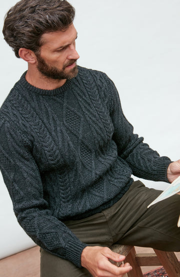 black mens chunky merino wool cable jumper by Paul James