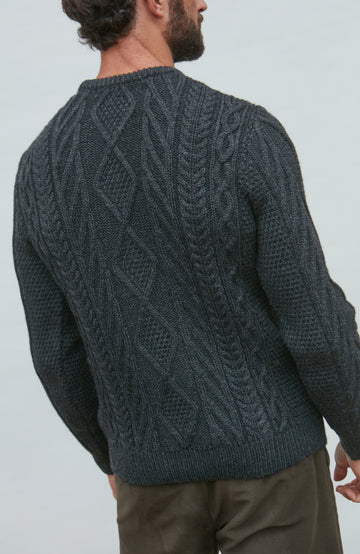 black mens chunky merino wool cable jumper by Paul James