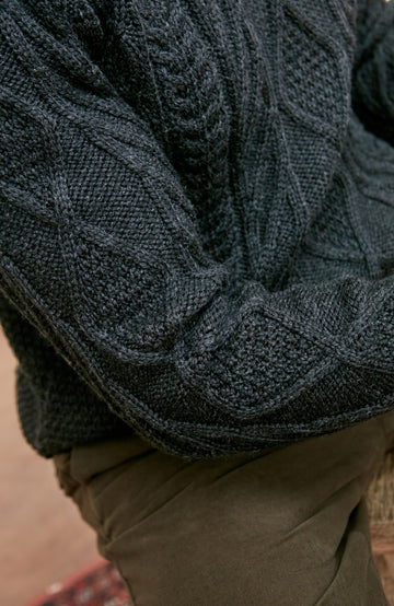 black mens chunky merino wool cable jumper by Paul James