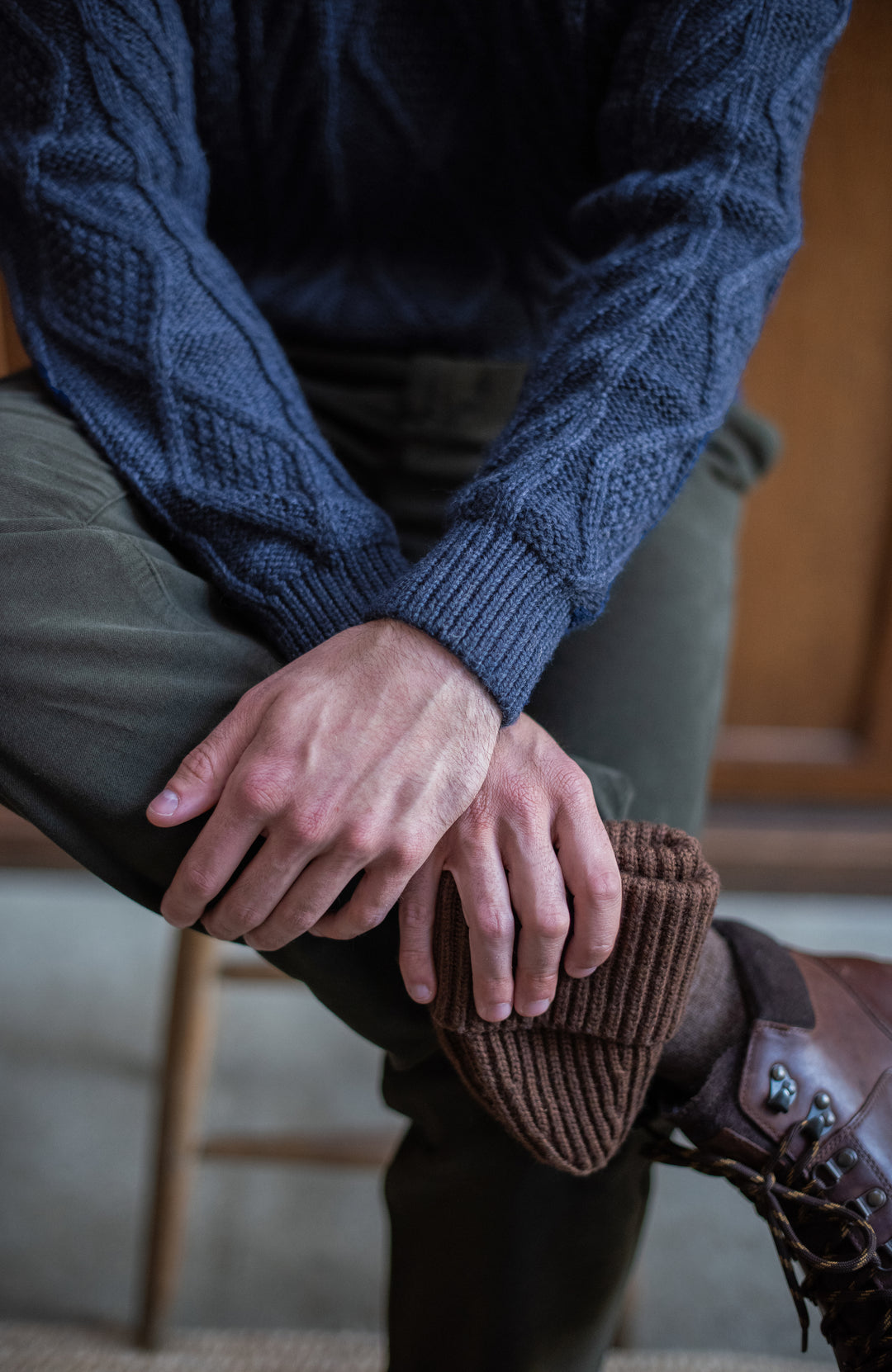Navy mens merino wool cable jumper by Paul James