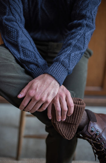Navy mens merino wool cable jumper by Paul James
