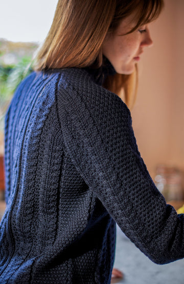 Navy women's chunky cable Merino wool jumper by Paul James