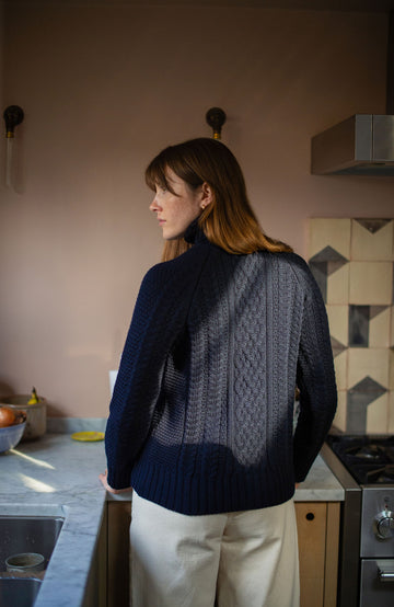Navy women's chunky cable Merino wool jumper by Paul James