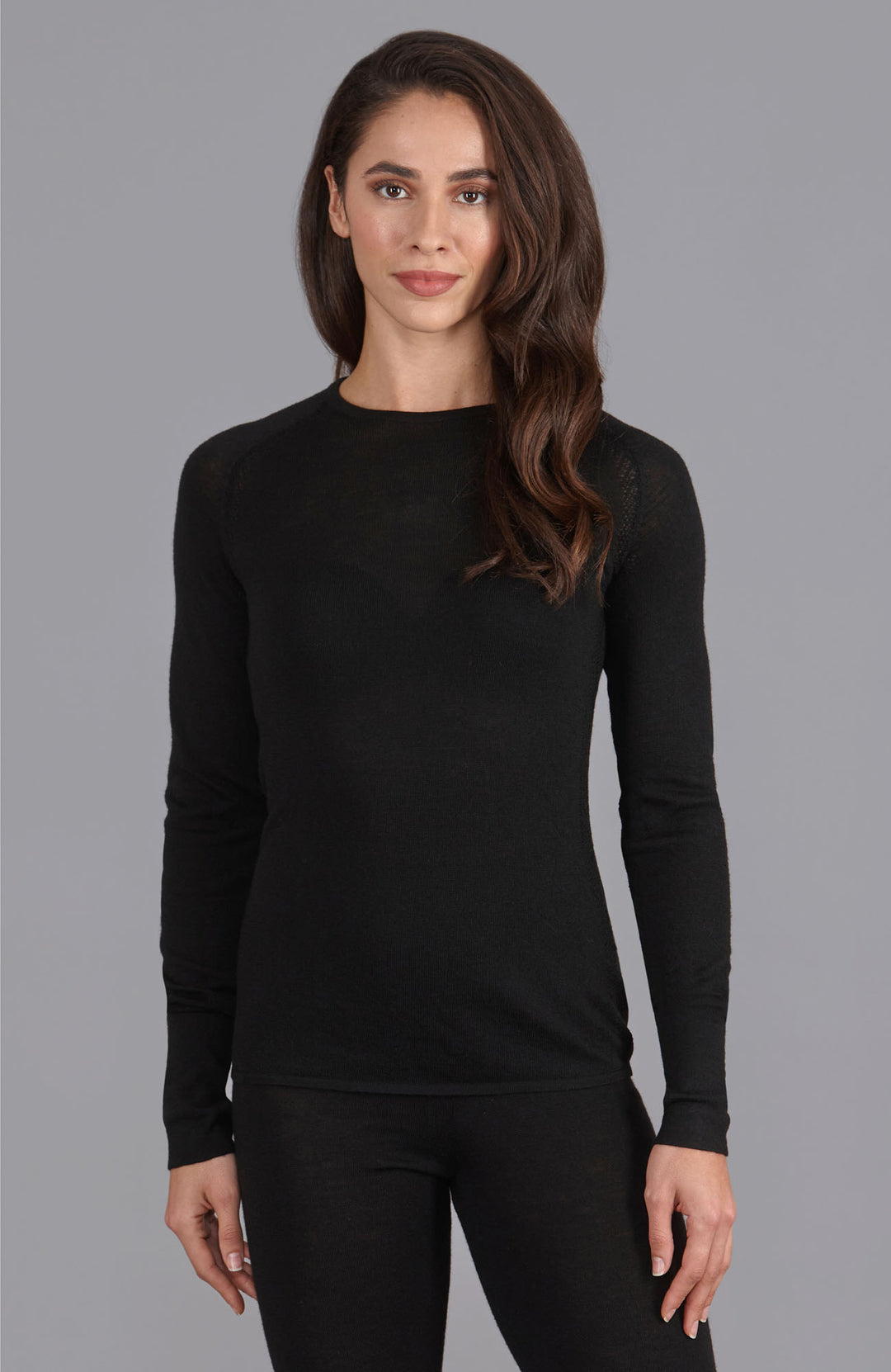 Black womens merino wool round neck jumper by Paul James