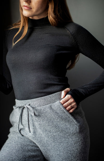 Black womens merino activewear top by Paul James 