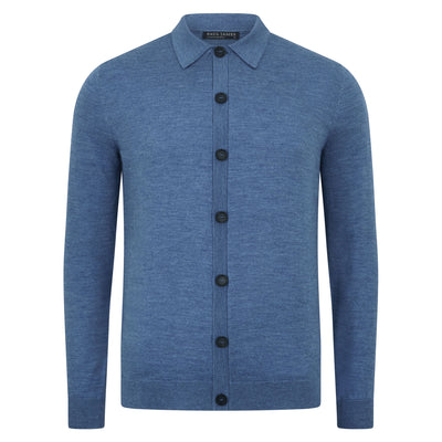 Man wearing a denim blue merino wool button-up shirt against a gray background