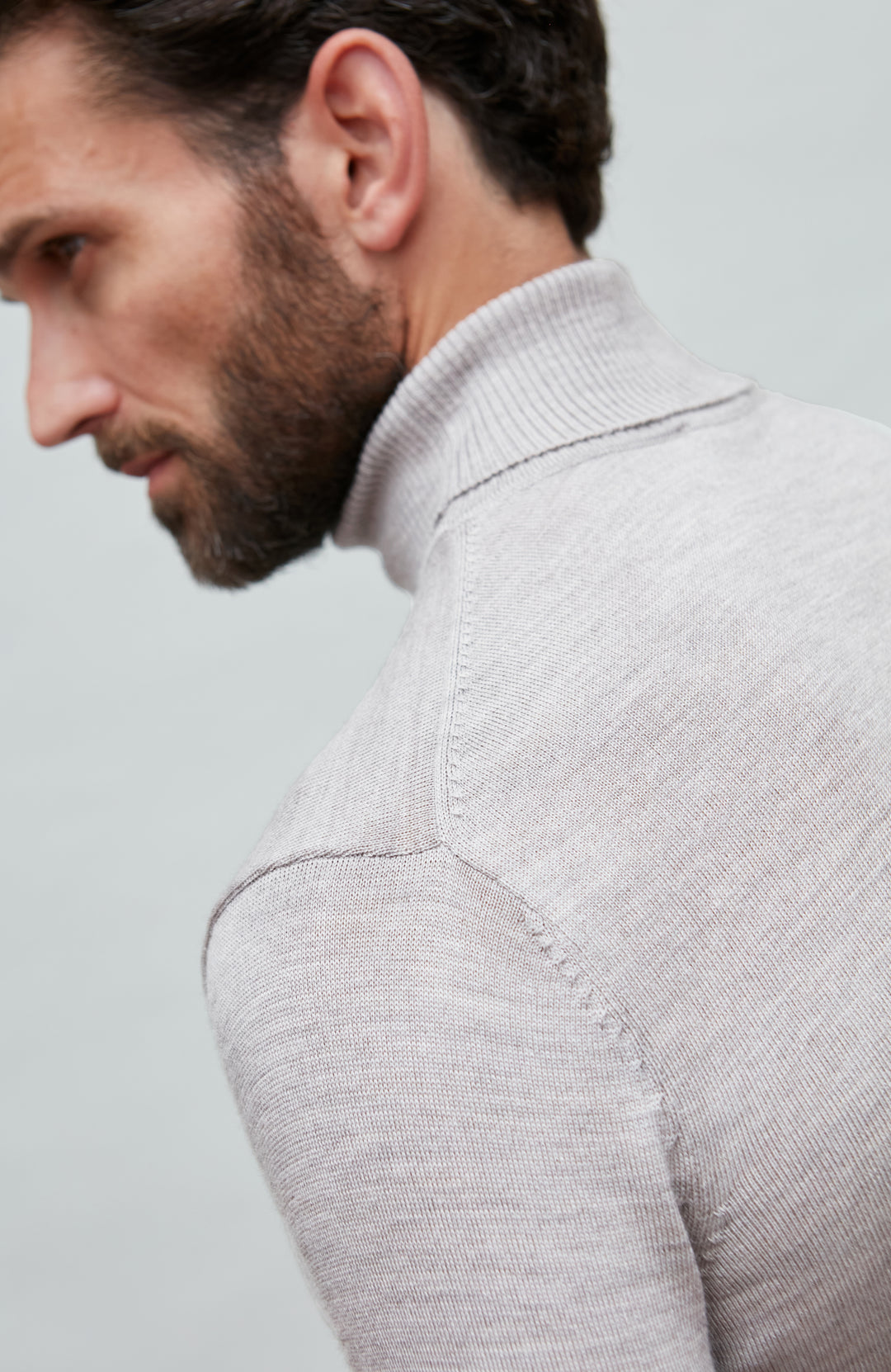 beige fine merino wool roll neck jumper by Paul James