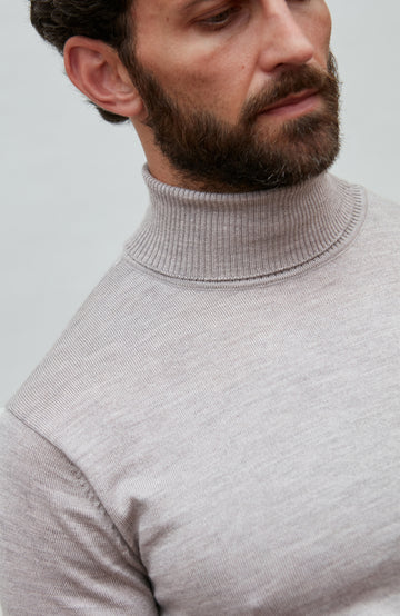 beige fine merino wool roll neck jumper by Paul James