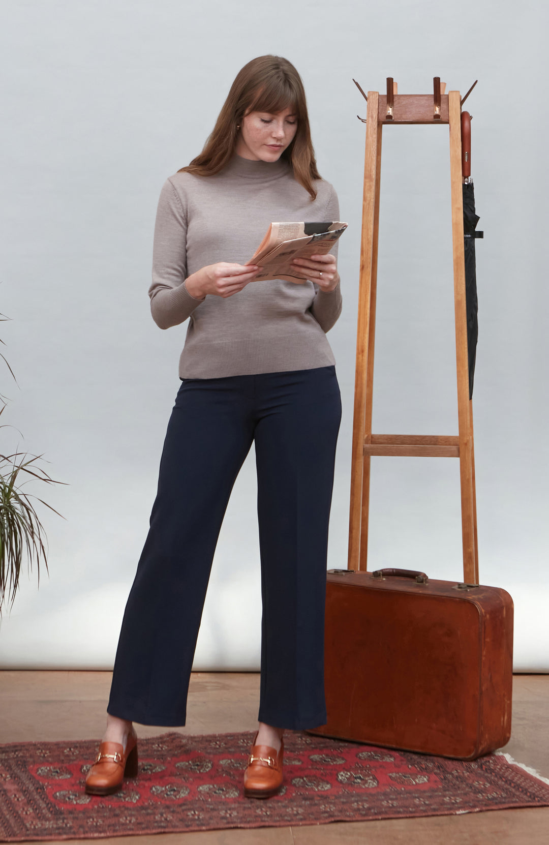 Beige women's extra fine merino wool mock neck jumper with back detail by Paul James Knitwear