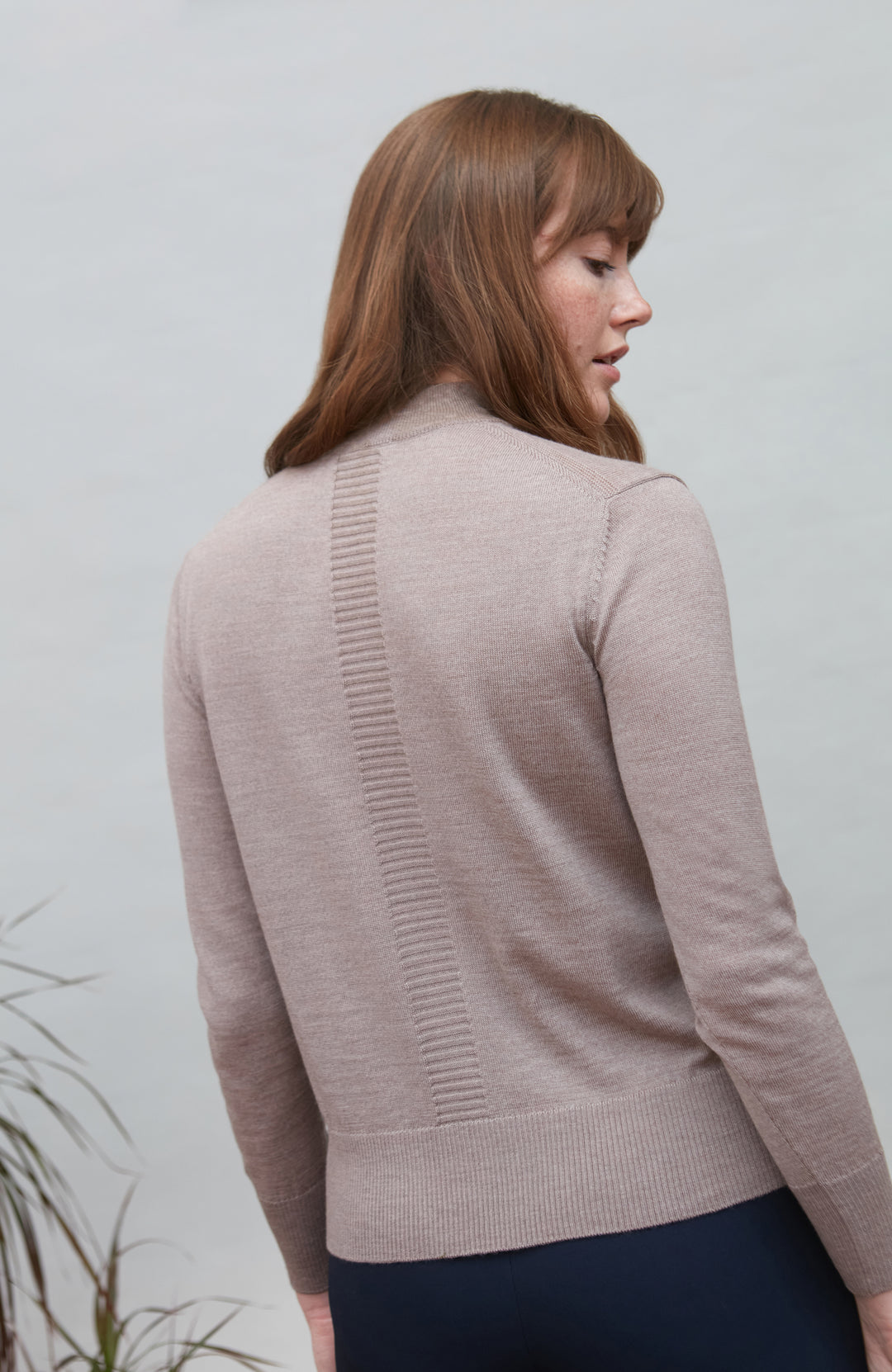 Beige women's extra fine merino wool mock neck jumper with back detail by Paul James Knitwear