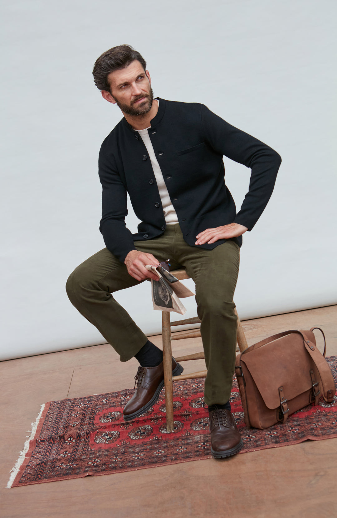 black mandarin collar jacket in fine wool by Paul James