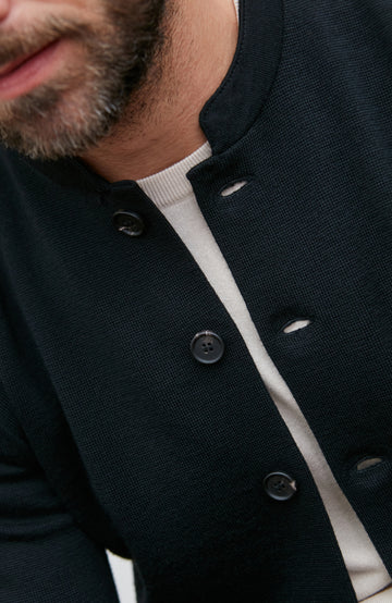 black mandarin collar jacket in fine wool by Paul James