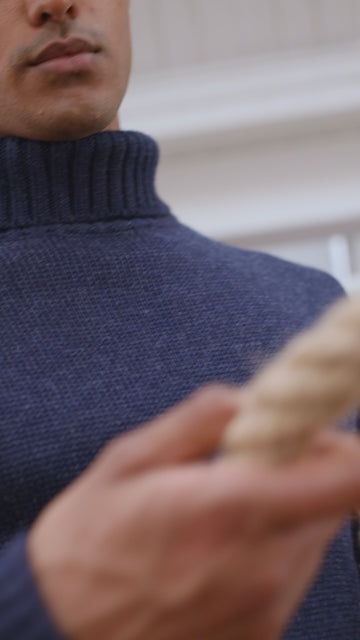 Men's navy chunky wool roll neck sweater by Paul James Knitwear